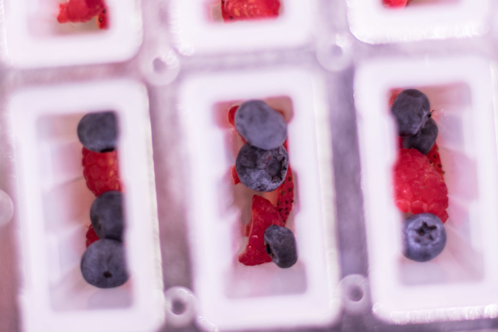 Layer the berries in your popsicle molds for a bit of fruit in every bite!
