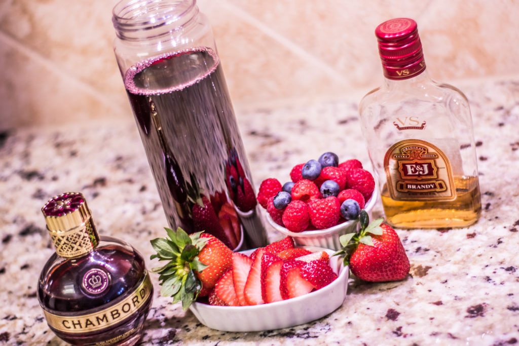 Merlot, Chambord, Brandy, and Fresh Fruit combine to make a delicious Berry Sangria Popsicle!