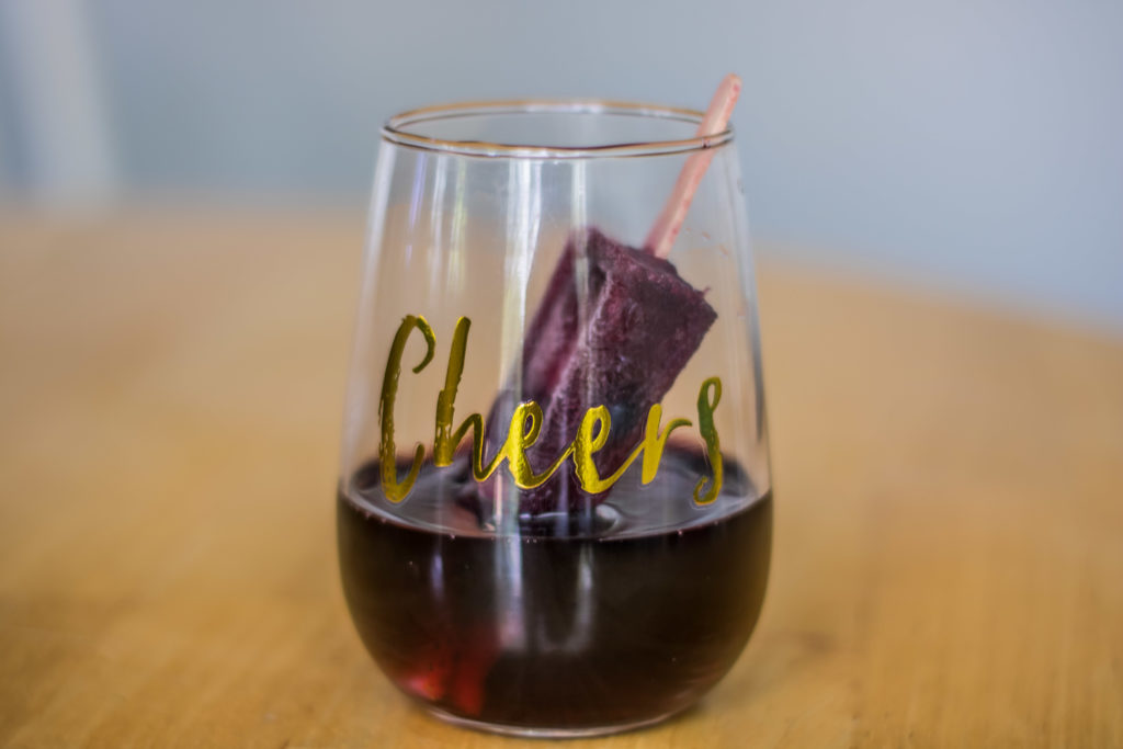 Serve Berry Sangria Popsicles in a glass of red wine to catch the drips!